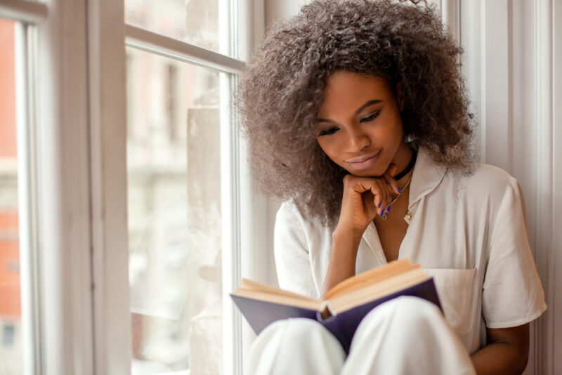 Woman reading for self care