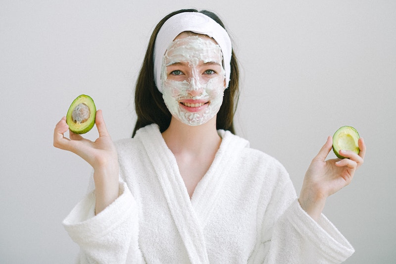 Woman in a DIY avocado face mask
